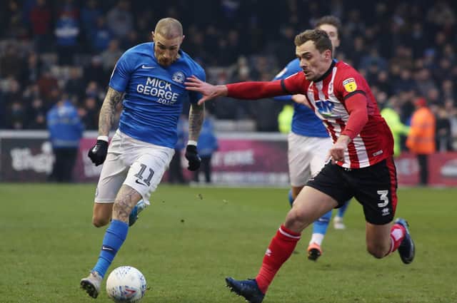 Marcus Maddison in action for Posh.