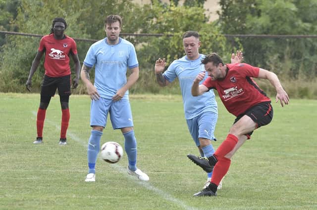 Action from Stilton United (red) earlier this season.
