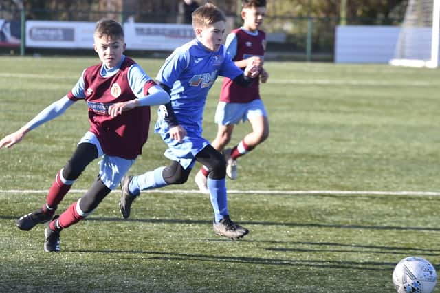 Action from Yaxley v Deeping Rangers Claret in Under 13 Division One of the Junior Alliance League. Photo: David Lowndes.