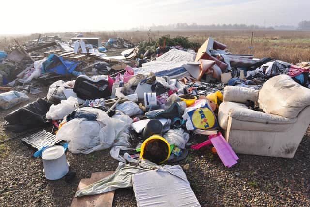Flytipping along Storey's Bar Road  Fengate in two spots. EMN-170602-141350009