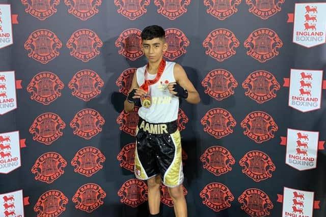 Aamir Shirazi with his gold medal.