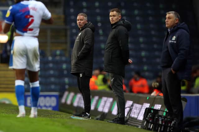 Peterborough United Manager Darren Ferguson watches on from the touchline alongside Blackburn Rovers Manager Tony Mowbray. Photo: Joe Dent.