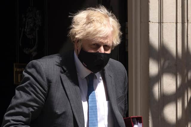 Boris Johnson with his face mask