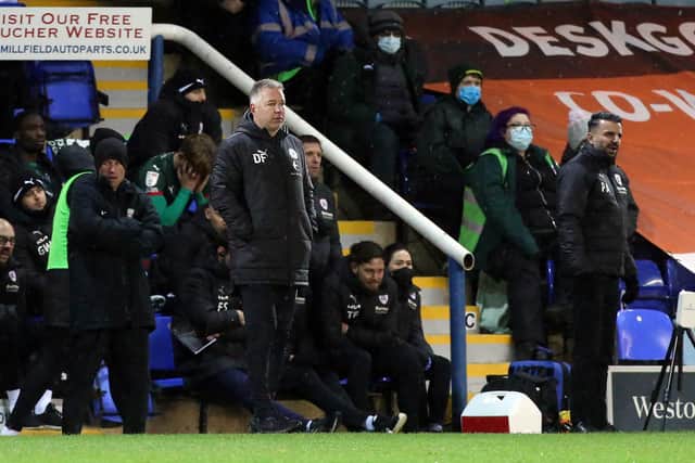 Posh boss Darren Ferguson watching last weekend's game with Barnsley.