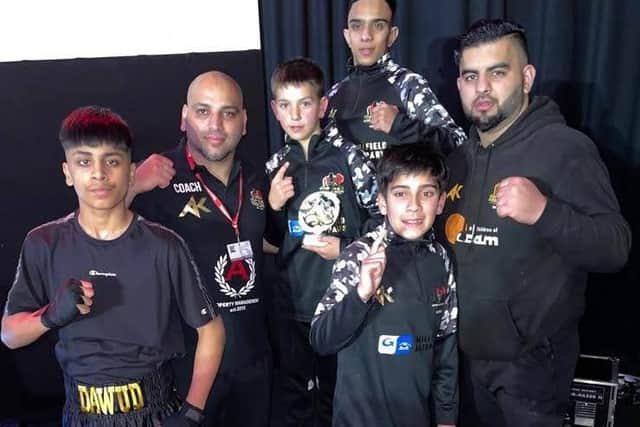 Jacob Hussain, Santino Harris, Dawud Ahmed and Subhaan Mohammad with coaches Hamed Javed & Waqas.