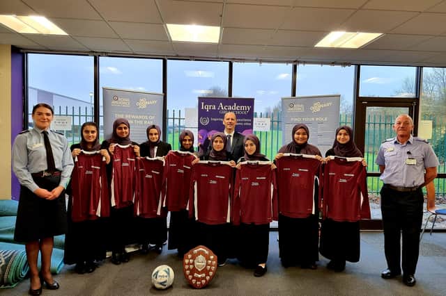 The Iqra Academy girls football team reecive a shirt sponsorship from the Royal Air Force.