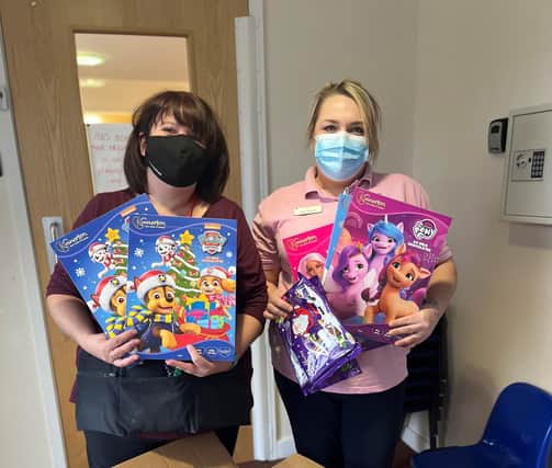 Activity coordinators Kay and Alicia donated the well-received advent calendars and selection boxes.