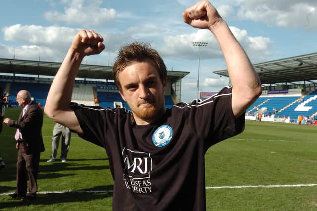 Charlie Lee celebrates promotion from League One with Posh at Colchester in 2009.