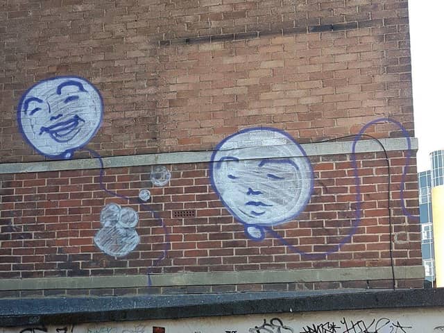 Street art in the alleyway between Cattle Market Road and Broadway. Photo: David Lew.