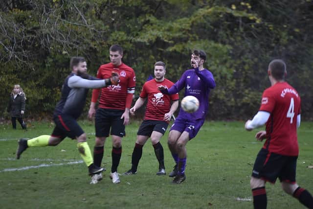 Action from Peterborough City 3, Polonia 4 in Peterborough League Division Two. Polonia are in red. Photo: David Lowndes.
