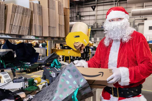 Amazon has donated £10,000 to Embrace Child victims of Crime. Pictured is  Gareth Davies as Santa.