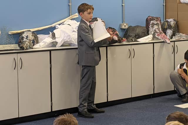 Sam with his work during the 'Our Planet' programme.