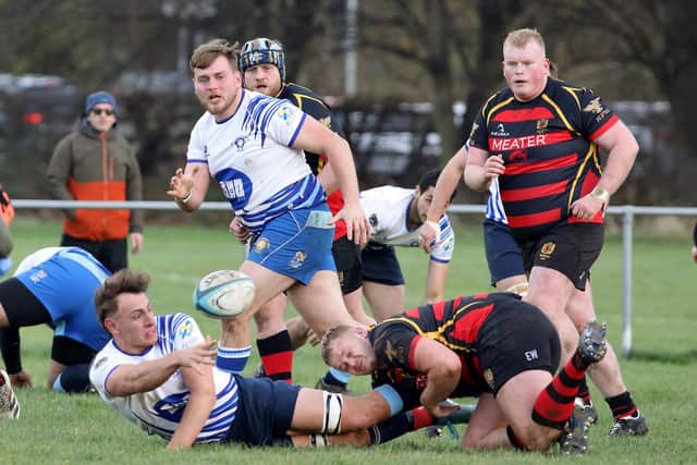 George Roberts offloads for Lions at Belgrave. Photo: Mick Sutterby.