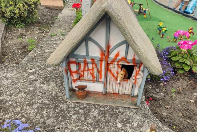 The Banksy artwork at the Merrivale Model Village in Great Yarmouth which will go for auction in January.