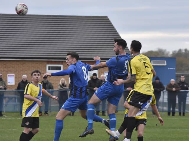Action from Whittlesey's (blue) win over Worcester City in the FA Vase. Photo: David Lowndes.
