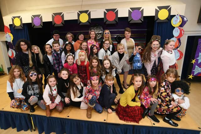 Werrington primary school  pupils and staff dressed in 1960's gear to celebrate the school's birthday. EMN-210712-234829009