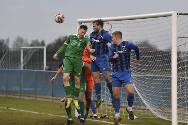 Action from the FA Vase match between Whittlesey Athletic v Newport Pagnell FA Vase tie at Feldale Field.  Photo: David Lowndes.