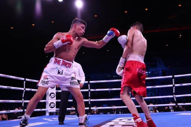 Jordan Gill (left) in action against Alan Castillo. Photo: Matchroom Boxing.