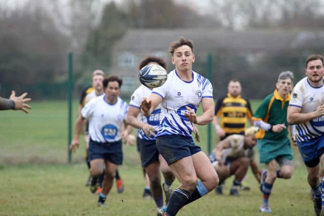 George Roberts of Peterborough Lions throws out a pass in the match against Derby. Photo: Mick Sutterby.
