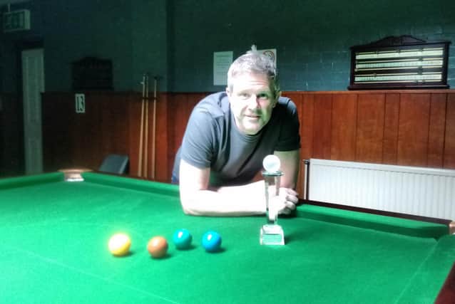 Mark Gray with the spoils of his latest snooker success.