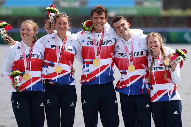 James Fox (centre) with his GB Paralympic gold medal winning crew. Photo: Naomi Baker/Getty Images.