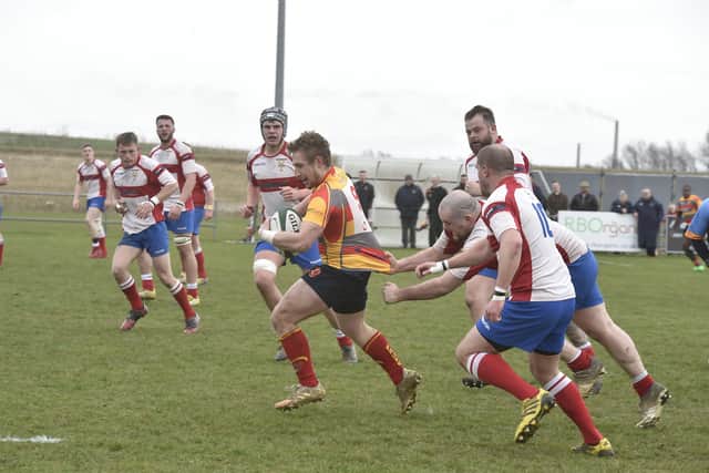 Ross Chamberlain (with ball) has enjoyed a fine season for Peterborough RUFC so far.