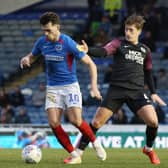 John Marquis in action for Portsmouth against Posh.