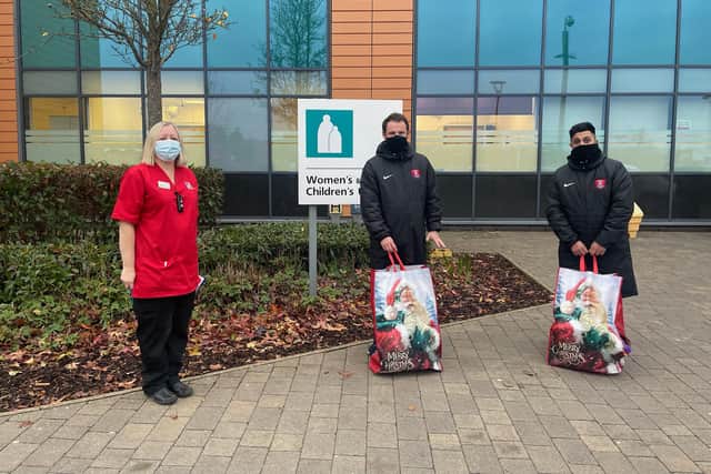 Glenn and Harsh visit Peterborough City Hospital to drop off the presents.