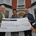 Martin Collcott, Zillur Hussain (chairman of the Zi Foundation) and  Chavdar Zhelev from the Tavan restaurant with a cheque to supply 900 students from three  Bangladesh schools with uniforms following the restaurants fundraising evening.