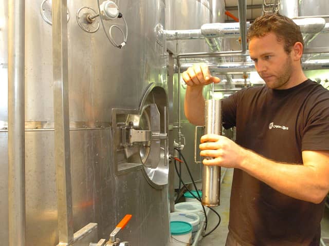 Alex Kean testing the beer at Oakham Ales.
