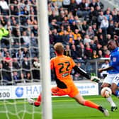 Emile Sinclair scores his second goal of a hat-trick for Posh at Hull City in a Championship fixture in September, 2012.