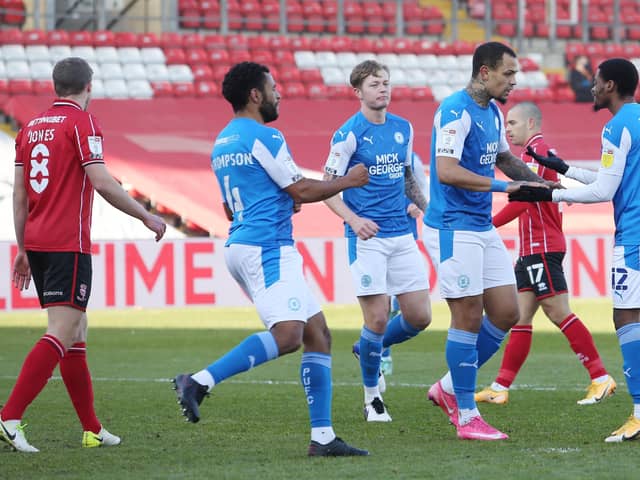 Posh celebrate their goal at Lincoln City in their first game of 2021.