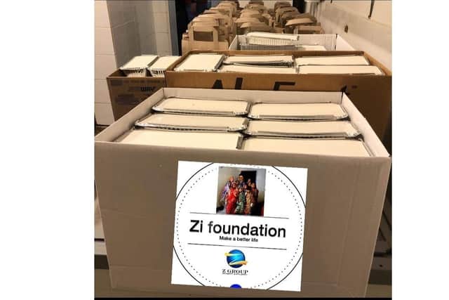 Christmas meals prepared and packed by the Zi Foundation and Bengali Brotherhood.