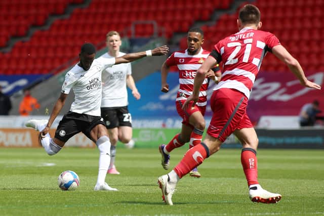 Mo Eisa scores the Posh goal of the year at Doncaster.