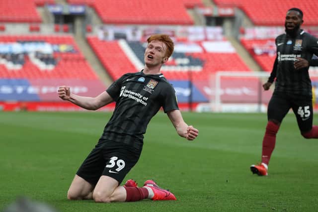 Callum Morton celebrates his goal for Northampton Town against Exeter City in the League Two play-off final in 2020. Photo: David Rogers, Getty Images.