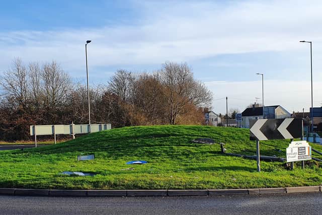The damage caused to the roundabout on the A1139/Peterborough Road.