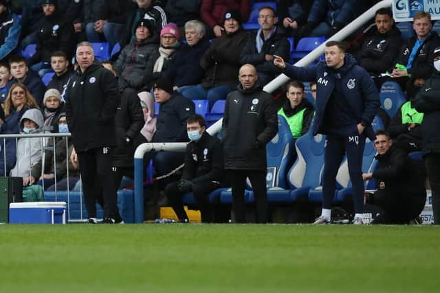 Peterborough United manager Darren Ferguson (left) on the touchline against Bristol Rovers. Photo: Joe Dent/theposh.com.