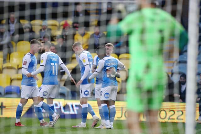 Sammie Szmodics of Peterborough United celebrates scoring the opening goal of the game against Bristol Rovers. Photo: Joe Dent/theposh.com.
