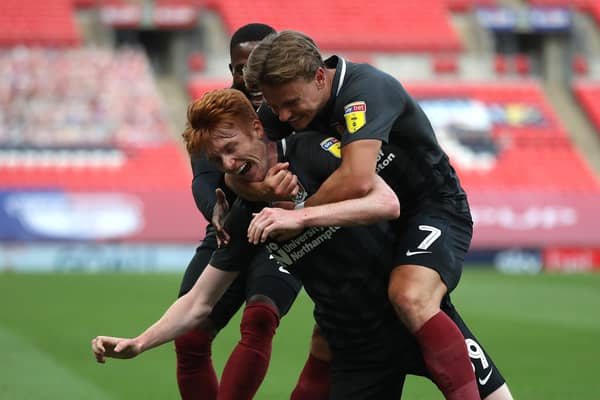 Callum Morton is mobbed after scoring for Northampton Town in the League Two play-off final at Wembley in 2020. Photo: Dave Rogers, Getty Images.