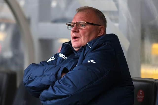 Steve Evans last season.