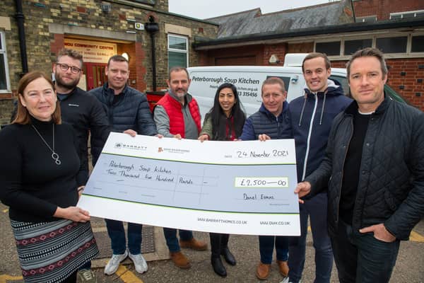 Directors from Barratt and David Wilson Homes' present Peterborough Soup Kitchen with a cheque. Photo: Steve Baker.