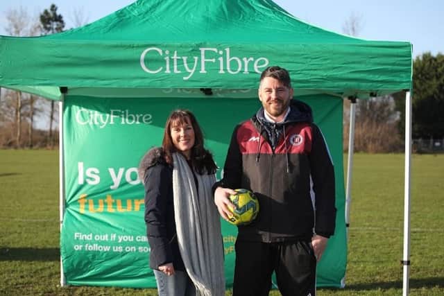 Rebecca Stephens, CityFibre’s Regional Partnership Director and City Manager for Peterborough, with John Dalton, who coaches the under 13s team at Thorpe Wood Rangers FC.