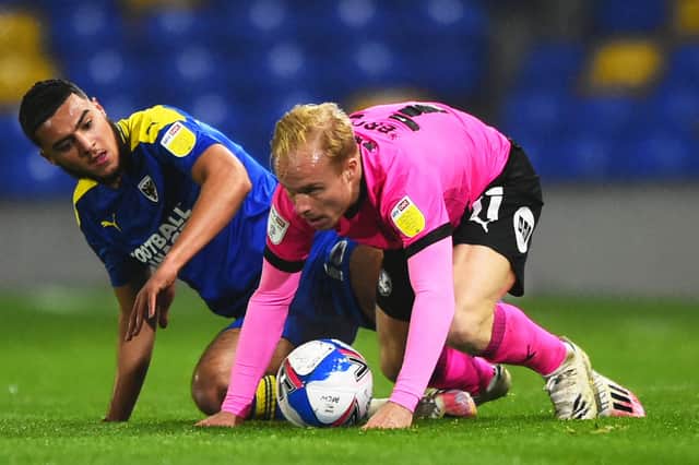 Ryan Broom in action for Posh. Photo: Tom Dulat/Getty Images.