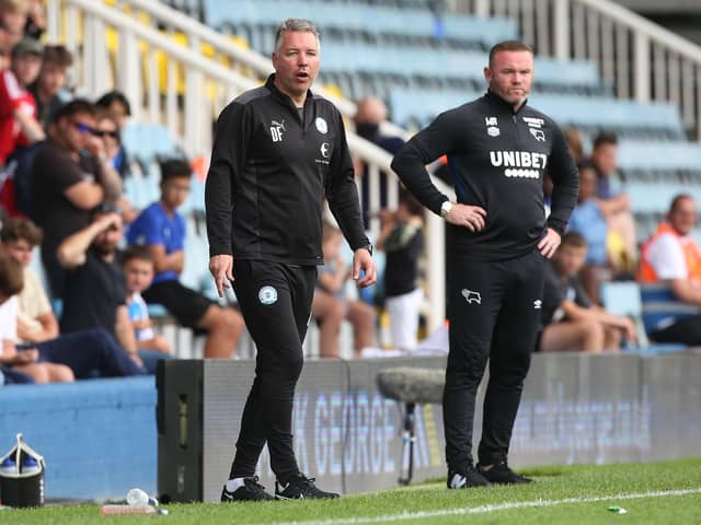 Wayne Rooney on the touchline when Derby came to Posh in August. Photo: Joe Dent.