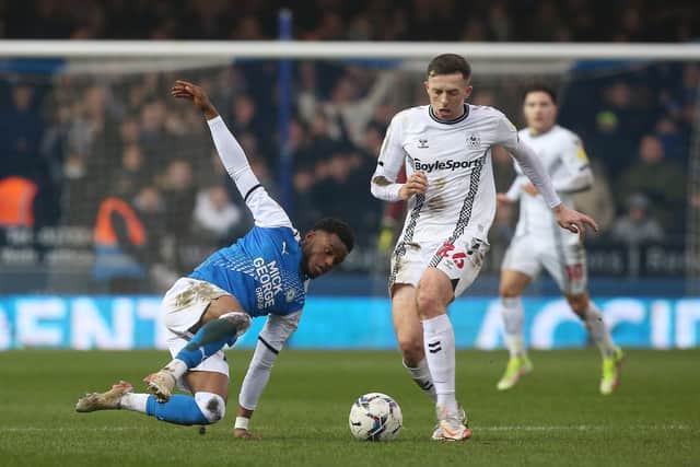 Bali Mumba of Posh slips during the game against Coventry City. Photo: Joe Dent/theposh.com.