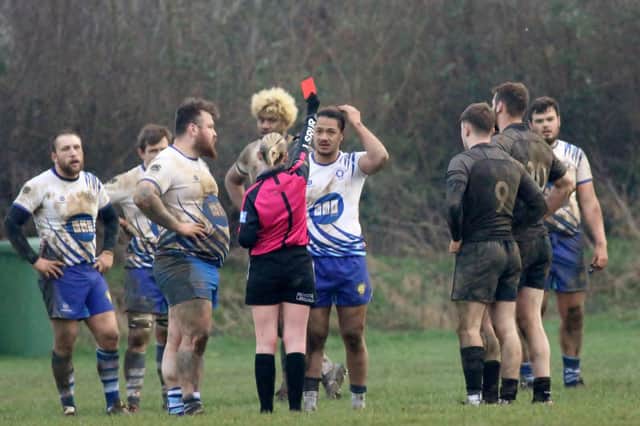 Lions player Weir Filikitonga is shown a red card at Market Harborough.