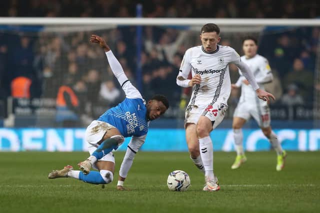Bali Mumba in action for Posh.