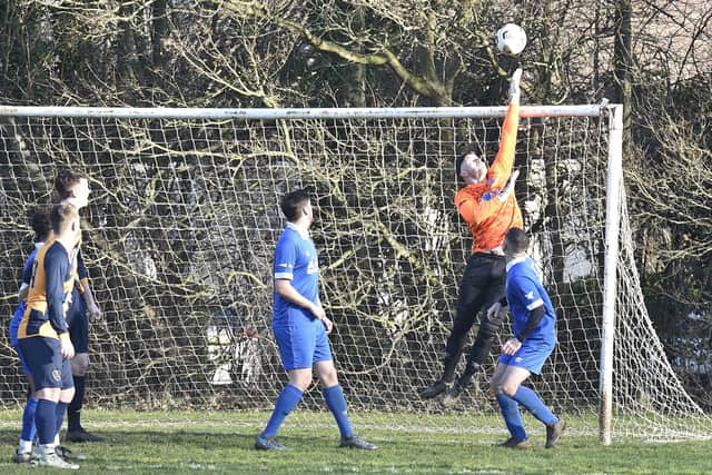 Action from Glinton & Northborough Reserves v Brotherhood (blue) in Division Two of the Peterborough Sunday Morning League. Photo: David Lowndes.