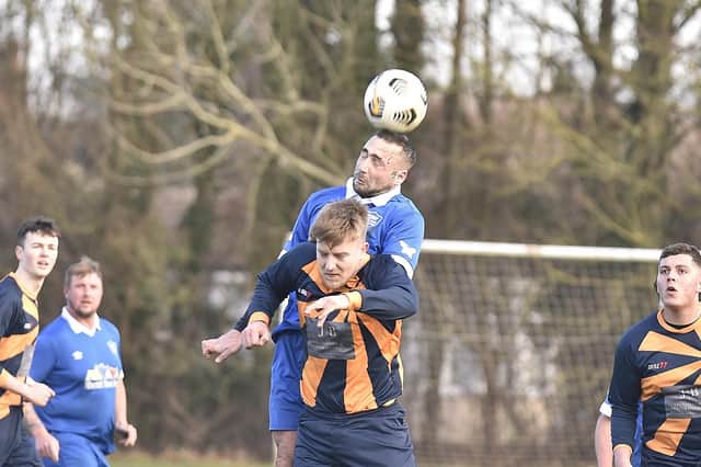 Action from Glinton & Northborough Reserves v Brotherhood (blue) in Division Two of the Peterborough Sunday Morning League. Photo: David Lowndes.