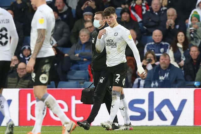 Posh defender Ronnie Edwards is taken off at West Brom. Photo: Joe Dent/theposh.com